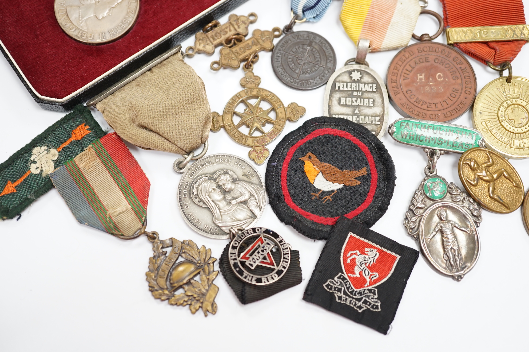 A collection of medals and badges, including eight Special Constabulary Service Medals, Fire Service Medal, a cased Police Long Service and Good Conduct Medal, masonic awards, including hallmarked silver gilt 1897 Diamon